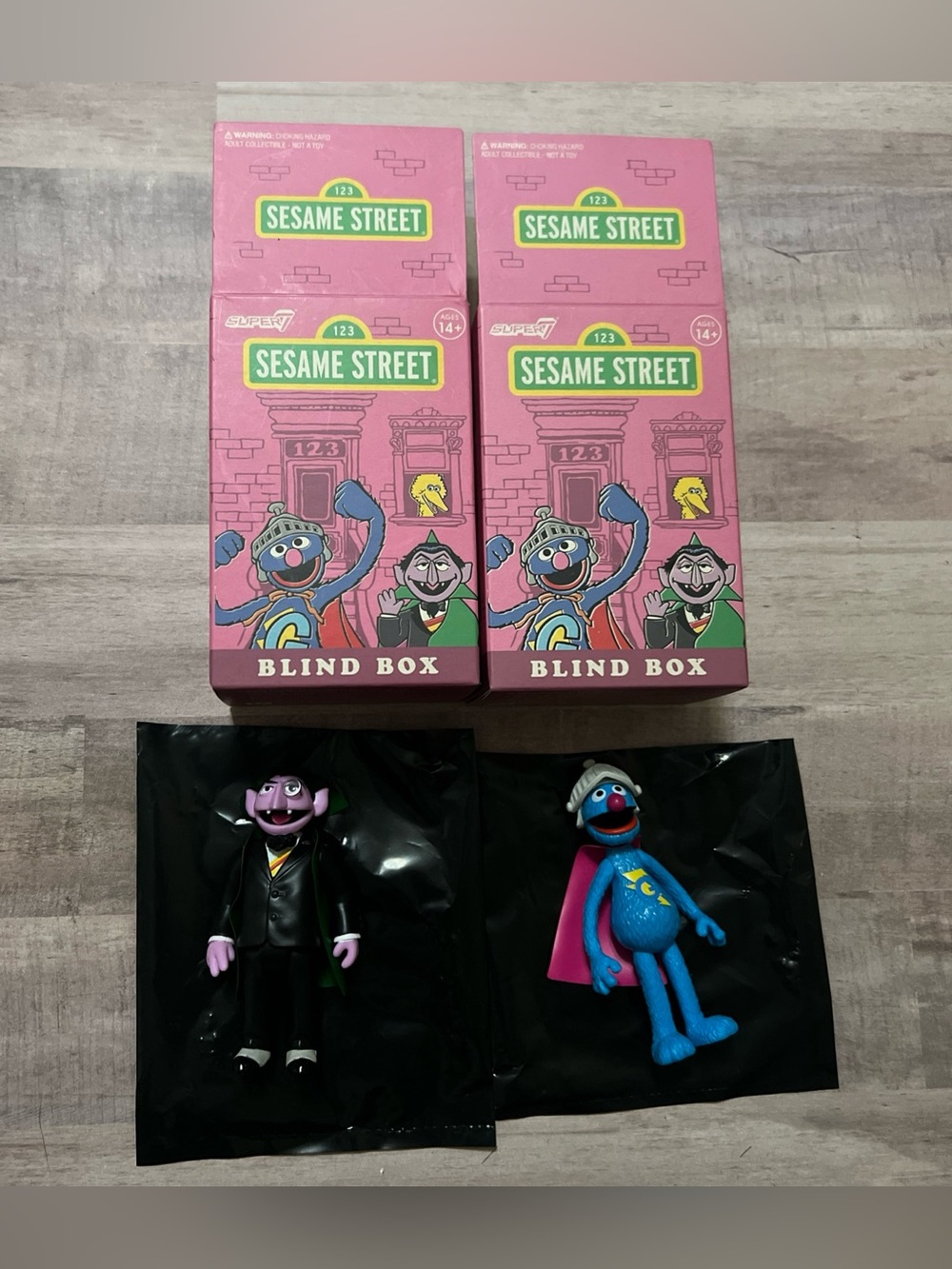 Lot Of 2 Super7 Reaction Sesame Street Super Grover & Count Blind Box Figures